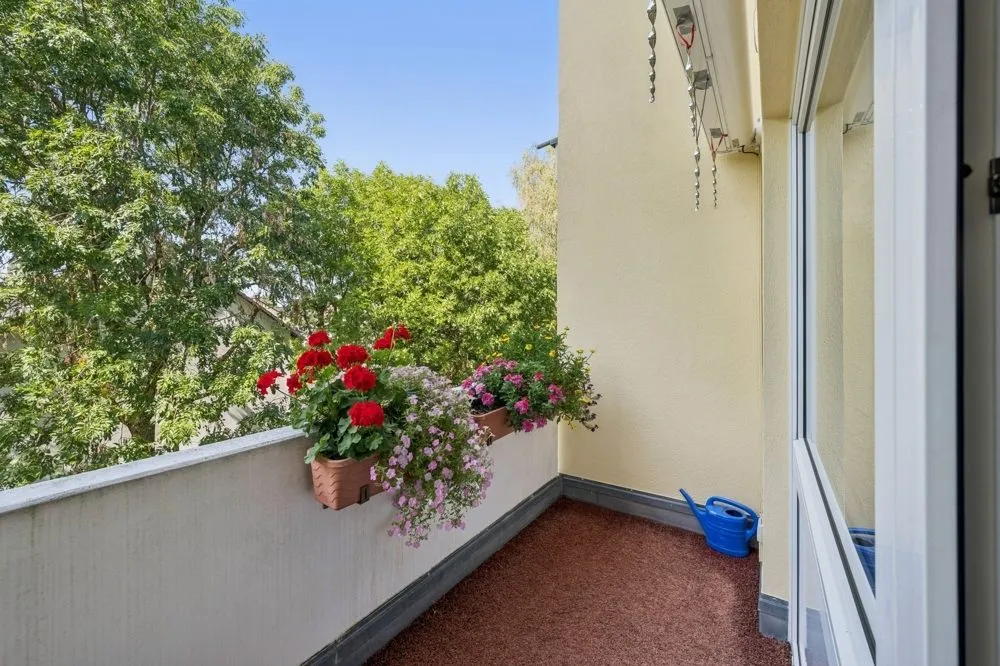 Immobilienangebot - Puchheim / Puchheim-Bahnhof - Alle - Gepflegte Maisonette-Wohnung mit zwei Balkonen